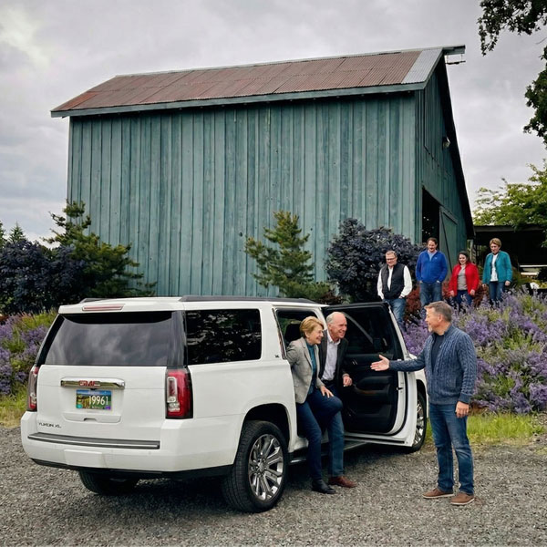 Guests arriving for a Cuvée Hourly Experience wine tour in the Willamette Valley